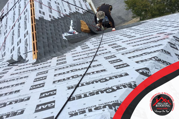 A North Port Roofing professional from Hill Top Roofing installing a new roof designed to withstand extreme weather conditions.